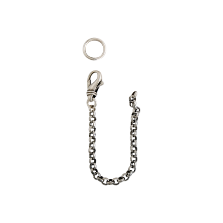 Sikringslenkje til veskelås, oksidert. Graffer  Sikringslenkje til veskelås, oksidert. Graffer