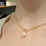 Smykke i 14kt gull med perle - coc7508