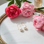 Øredobber i gult gull 14kt med ferskvannperler - Bur711254