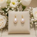 Øredobber i gult gull 14kt med ferskvannperler - Bur711148