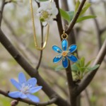 Smykke i forgylt sølv Blåveis. LIV - 860412