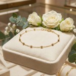 Armbånd med kuler i gult gull 14kt, 19 cm - 16967