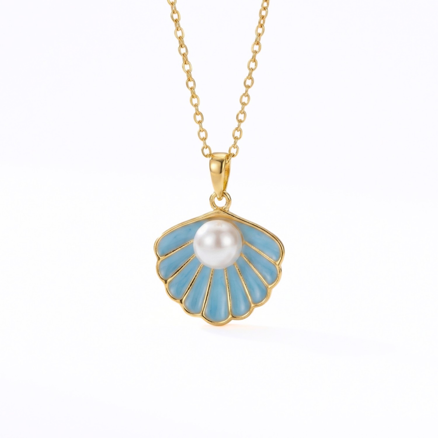 Smykke i forgylt sølv med lys blå coloritt og perle - 3042542