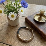 Armbånd i bronse Dronningsmykket. HILLESTAD - K359