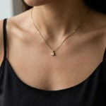 Smykke i gult gull med zirkonia -32500445