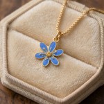 Smykke i forgylt sølv Blåveis. LIV - 860412