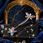 Swarovski brosje med øyenstikker og blomster- 5737428